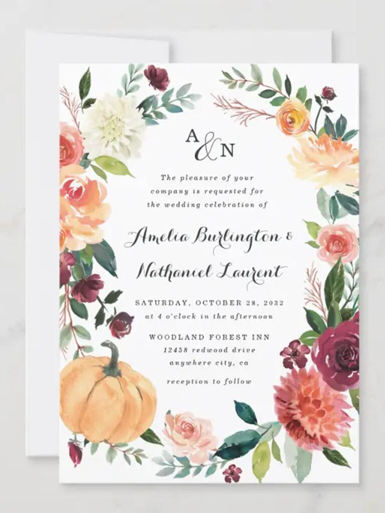 Watercolor florals and pumpkin bordering personalized monogram and event details in elegant script with
