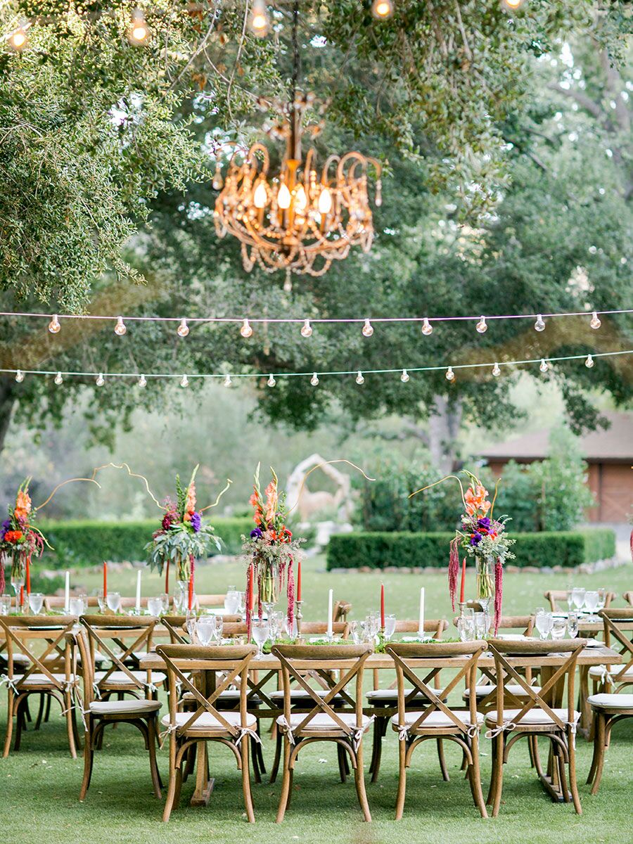 Outdoor chandelier in trees rustic