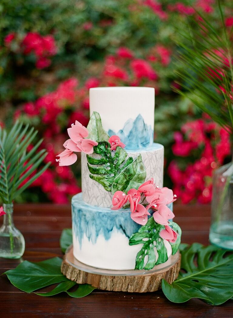 Tropical three-tier cake with painted decorations