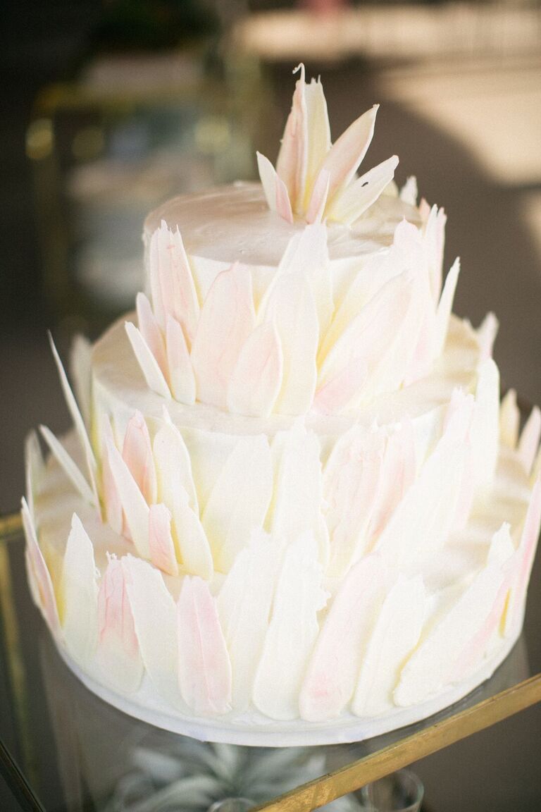 Three-tier modern wedding cake with brush stroke details