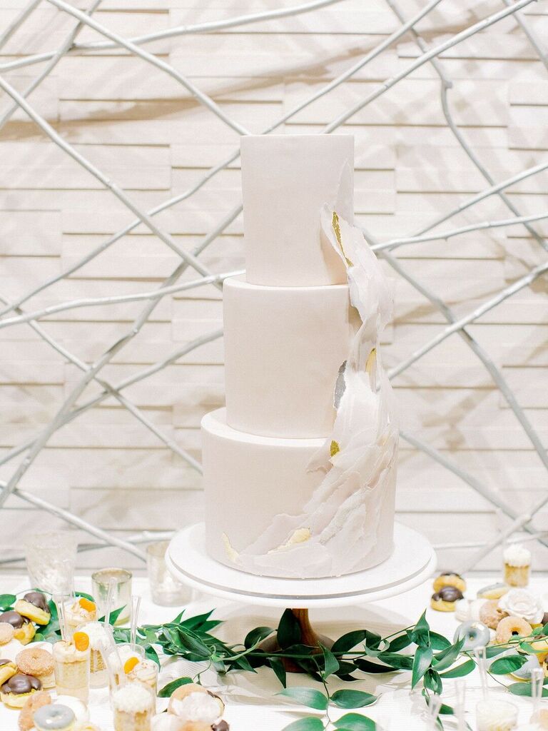 Modern three-tier wedding cake with ruffles